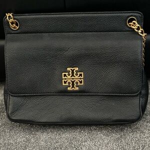 Tory Burch black shoulder bag with matching zip around wallet